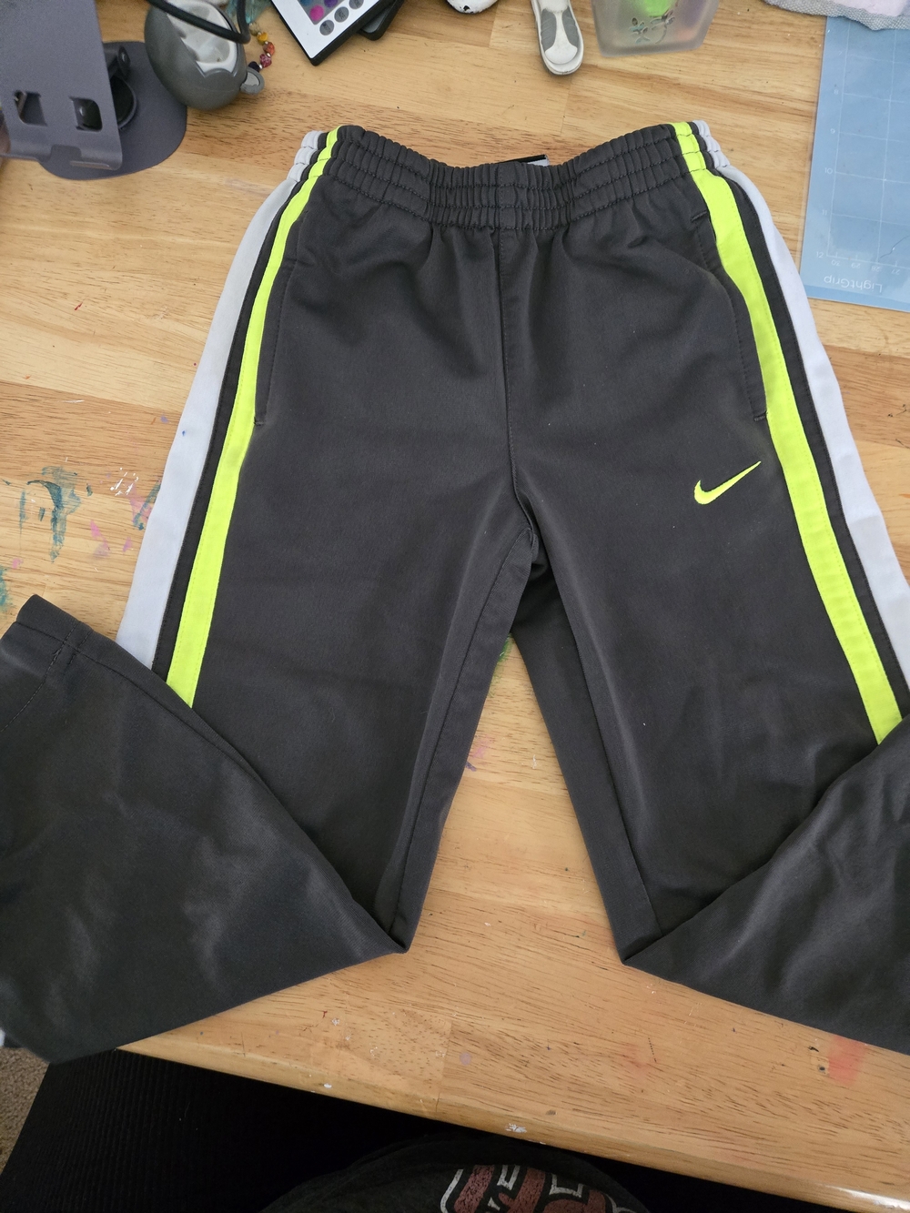 Nike Kids Black Sweatpants with Neon Green and Gray Side Stripes